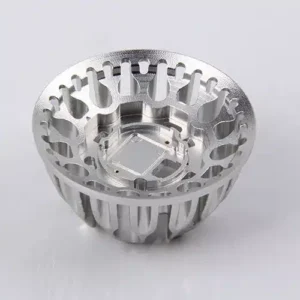 High-precision CNC machined aluminum heat sink by ZhuanXin Precision with intricate design for industrial use.
